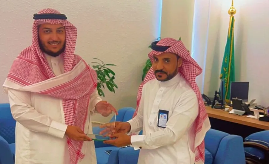 A team of the Archives & Records Center visits the Qassim University  - .