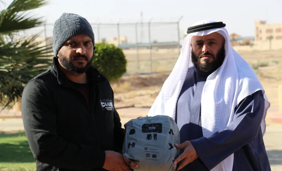 The Applied College distributes Winter Cloths for janitors  -  كسوة