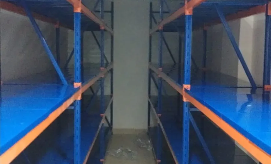 The General Administration of Facilities prepares the warehouse shelves in colleges and administrations - أرفف مستودعات