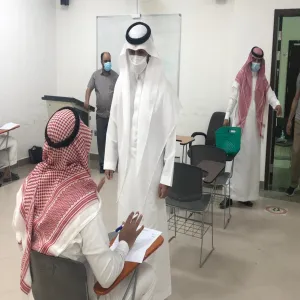 The dean of Engineering on inspection tour to final exam halls