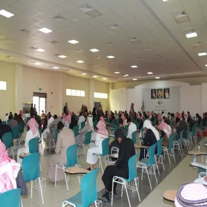 The chairman of the college's council on inspection tour to exam halls