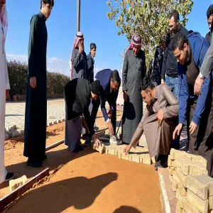 Faculty members and students participate in maintaining King Fahd Road walkway