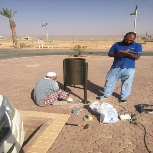 Installation of Cement Chairs and Trash Bins