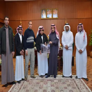 A GROUP OF MECHANICAL ENGINEERING STUDENTS PRESENTS THEIR INVENTION TO HIS HIGHNESS THE RECTOR