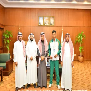 HIS EXCELLENCY THE RECTOR AWARDS THE WINNER OF GOLDEN AND SILVER MEDAL IN 100 &amp; 200 M. RACE AT THE LEVEL OF SAUDI UNIVERSITIES